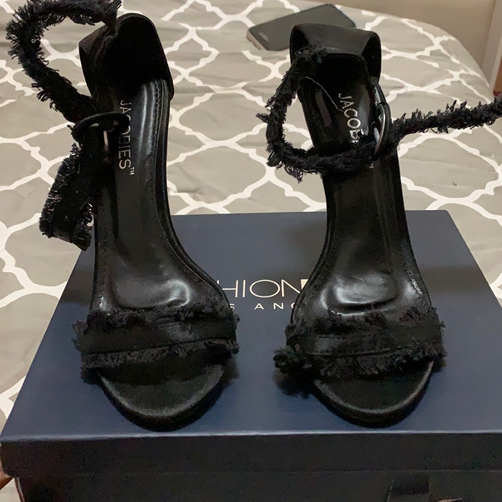 Black statin frill heels